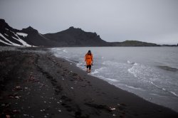 A scientist searches for samples in Antarctica, where ice is melting so rapidly it has become “ground zero of global climate change without a doubt,” said Harvard geophysicist Jerry Mitrovica.